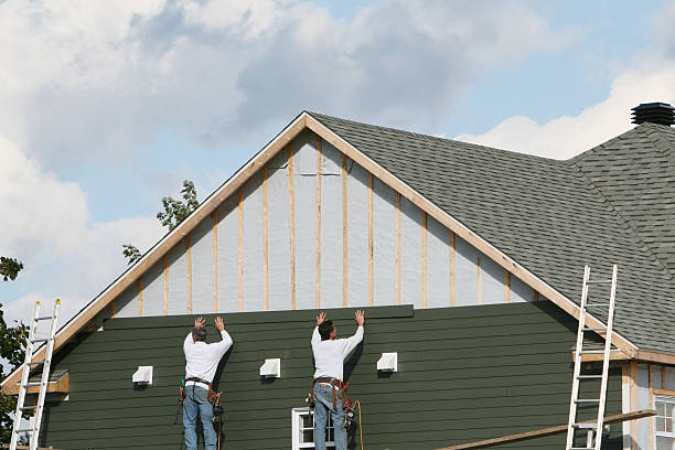 Professional Siding Replacement technician working in Cedar Grove, NC